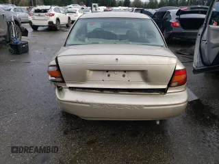 2001 Saturn SL z VIN 1G8ZH52851Z286886, wystawiony jako Copart lot #84883824 z przebiegiem Nie podano mil oraz Szkoda całkowita • Salvage title. Historia ofert i sprzedaży dostępna na DreamBid. Obrazek 6.