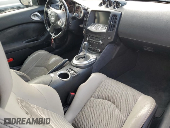 2010 Nissan 370Z Touring с VIN JN1AZ4FH2AM302093, выставлен на аукционе Copart как лот 86953624 с пробегом 138 845 миль миль и Списание • Salvage title. История ставок и продаж доступна на DreamBid. Изображение 8.