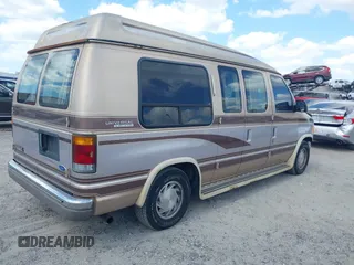 1994 Ford Econoline Cargo with VIN 1FDEE14N5RHB72537, listed as a IAAI auction lot 41968893 with 245,866 mi miles. Bid and sale history available at carsss.com. Image 4.