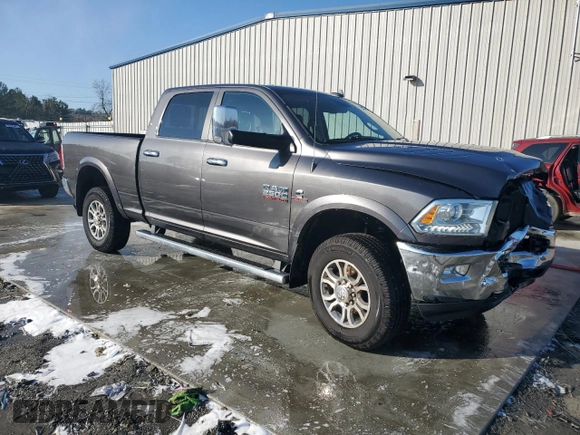 2014 Ram 2500 Laramie with VIN 3C6UR5FL4EG276004, listed as a Copart auction lot 42636305 with 228,911 mi miles and Salvage Title. Bid and sale history available at carsss.com. Image 4.