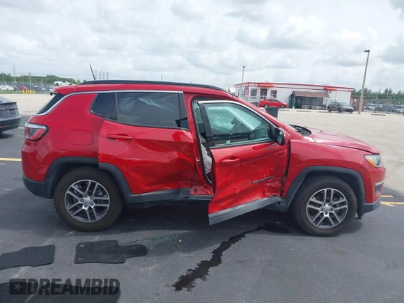 2019 Jeep Compass Latitude with VIN 3C4NJCBB8KT843811, listed as a IAAI auction lot 42442207 with 83,608 mi miles and . Bid and sale history available at DreamBid. Image 14.