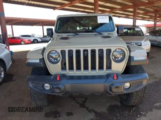 2022 Jeep Gladiator Rubicon with VIN 1C6JJTBG2NL164117, listed as a IAAI auction lot 42450350 with 22,326 mi miles and . Bid and sale history available at DreamBid. Image 12.