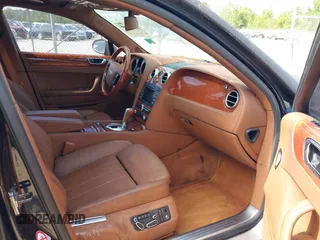 2006 Bentley Flying Spur z VIN SCBBR53W06C039791, wystawiony jako IAAI lot #42295068 z przebiegiem 48 739 mil mil oraz . Historia ofert i sprzedaży dostępna na DreamBid. Obrazek 5.