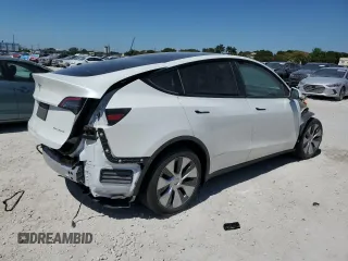 2023 Tesla Model Y Long Range with VIN 7SAYGDEEXPF770800, listed as a Copart auction lot 48324515 with 25,205 mi miles and Salvage Title. Bid and sale history available at DreamBid. Image 3.