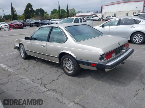 1985 BMW 6 Series 635CSi with VIN WBAEC8400F0610637, listed as a IAAI auction lot 41935412 with 129,943 mi miles. Bid and sale history available at carsss.com. Image 3.