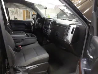 2017 GMC Sierra 1500 SLE with VIN 3GTU2MEC4HG448156, listed as a IAAI auction lot 42038642 with 135,373 mi miles and . Bid and sale history available at DreamBid. Image 5.
