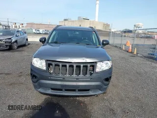 2013 Jeep Compass Latitude with VIN 1C4NJDEB7DD261645, listed as a IAAI auction lot 41948272 with 86,008 mi miles. Bid and sale history available at carsss.com. Image 6.