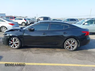 2016 Nissan Maxima SL z VIN 1N4AA6AP1GC383512, wystawiony jako IAAI lot #41490666 z przebiegiem 110 235 mil mil oraz . Historia ofert i sprzedaży dostępna na DreamBid. Obrazek 14.