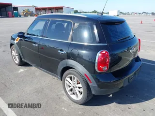 2013 MINI Countryman z VIN WMWZB3C52DWM07621, wystawiony jako IAAI lot #42085389 z przebiegiem 153 714 mil mil oraz . Historia ofert i sprzedaży dostępna na DreamBid. Obrazek 3.