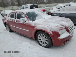 2010 Chrysler 300 with VIN 2C3CA6CT3AH250191, listed as a Copart auction lot 88148225 with 215,010 mi miles and Salvage Title. Bid and sale history available at carsss.com. Image 4.