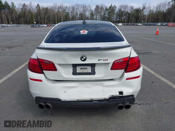 2013 BMW 5 Series 535i xDrive with VIN WBAFU7C51DDU68586, listed as a IAAI auction lot 41939159 with 111,496 mi miles and . Bid and sale history available at carsss.com. Image 16.