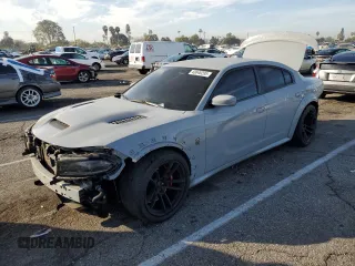 2022 Dodge Charger SRT Hellcat Redeye Widebody Jailbreak with VIN 2C3CDXL96NH180998, listed as a Copart auction lot 43646295 with 30,881 mi miles and Salvage Title. Bid and sale history available at carsss.com. Image 1.