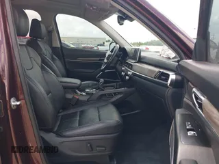 2020 Kia Telluride EX z VIN 5XYP34HC6LG093892, wystawiony jako IAAI lot #42097240 z przebiegiem 77 084 mil mil oraz . Historia ofert i sprzedaży dostępna na DreamBid. Obrazek 5.