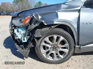 2020 Chevrolet Traverse Premier with VIN 1GNERKKW3LJ128117, listed as a IAAI auction lot 41857067 with 77,700 mi miles and . Bid and sale history available at DreamBid. Image 21.