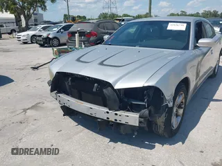 2012 Dodge Charger SE with VIN 2C3CDXBG5CH119493, listed as a IAAI auction lot 42126739 with 138,464 mi miles and . Bid and sale history available at carsss.com. Image 6.