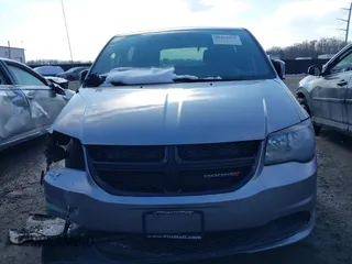 2016 Dodge Grand Caravan SE with VIN 2C4RDGBG7GR252195, listed as a IAAI auction lot 41415977 with 199,453 mi miles and . Bid and sale history available at DreamBid. Image 13.