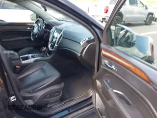 2013 Cadillac SRX Premium Collection with VIN 3GYFNEE34DS535613, listed as a IAAI auction lot 42336365 with 106,426 mi miles and . Bid and sale history available at DreamBid. Image 5.