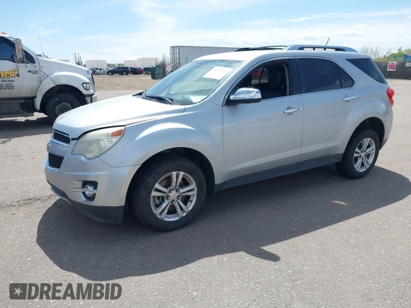2013 Chevrolet Equinox LTZ z VIN 2GNFLGEKXD6309001, wystawiony jako IAAI lot #42058332 z przebiegiem 144 250 mil mil oraz . Historia ofert i sprzedaży dostępna na DreamBid. Obrazek 2.