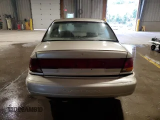 1996 Saturn SL z VIN 1G8ZK5274TZ233706, wystawiony jako Copart lot #54247795 z przebiegiem 62 941 mil mil oraz Czysty tytuł • Clean title. Historia ofert i sprzedaży dostępna na DreamBid. Obrazek 6.