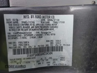 2006 Ford Focus S with VIN 1FAHP34NX6W234504, listed as a IAAI auction lot 42087837 with 142,265 mi miles and . Bid and sale history available at carsss.com. Image 9.
