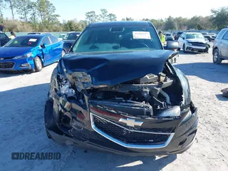 2015 Chevrolet Equinox LS z VIN 2GNALAEK7F1176799, wystawiony jako IAAI lot #41768447 z przebiegiem 99 311 mil mil oraz . Historia ofert i sprzedaży dostępna na DreamBid. Obrazek 13.