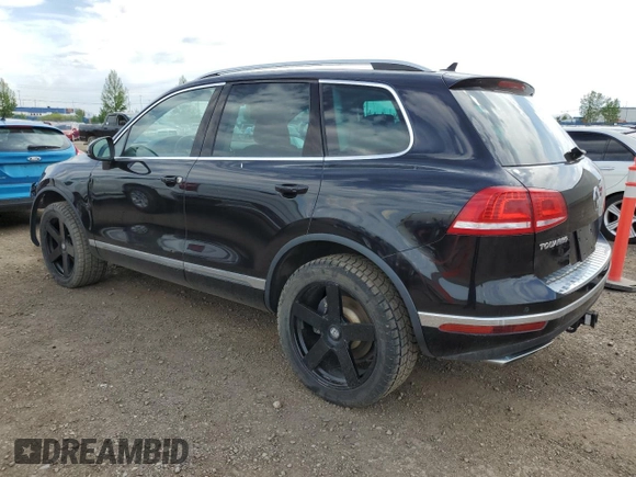 2015 Volkswagen Touareg Sport with VIN WVGEF9BP3FD004771, listed as a Copart auction lot 58668125 with 64,422 mi miles and Clean title. Bid and sale history available at DreamBid. Image 2.