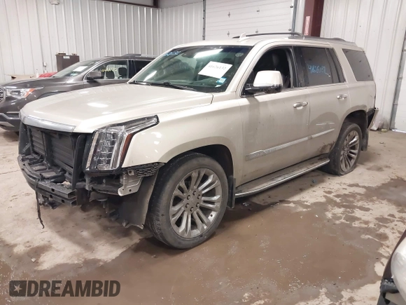 2017 Cadillac Escalade Premium Luxury z VIN 1GYS4CKJ9HR390988, wystawiony jako IAAI lot #41626132 z przebiegiem 166 185 mil mil oraz . Historia ofert i sprzedaży dostępna na DreamBid. Obrazek 19.