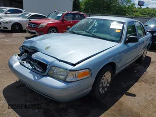 2008 Ford Crown Victoria z VIN 2FAFP73V28X126398, wystawiony jako IAAI lot #42349725 z przebiegiem Nie podano mil oraz . Historia ofert i sprzedaży dostępna na DreamBid. Obrazek 17.