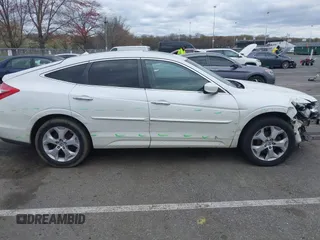 2010 Honda Crosstour EX-L z VIN 5J6TF2H57AL005231, wystawiony jako IAAI lot #42029109 z przebiegiem 134 451 mil mil oraz . Historia ofert i sprzedaży dostępna na DreamBid. Obrazek 13.
