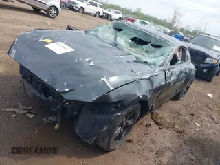 2015 Ford Mustang V6 with VIN 1FA6P8AMXF5369181, listed as a IAAI auction lot 42028414 with 88,344 mi miles and . Bid and sale history available at DreamBid. Image 2.