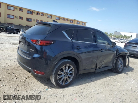 2021 Mazda CX-5 Grand Touring with VIN JM3KFBDM4M1462570, listed as a Copart auction lot 54827675 with 45,389 mi miles and Salvage Title. Bid and sale history available at DreamBid. Image 3.