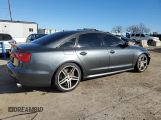 2015 Audi A6 Prestige z VIN WAUHGAFC2FN006252, wystawiony jako Copart lot #80515204 z przebiegiem 131 466 mil mil oraz Szkoda całkowita • Salvage title. Historia ofert i sprzedaży dostępna na DreamBid. Obrazek 3.