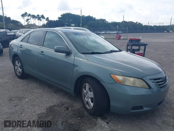 2007 Toyota Camry CE with VIN 4T1BE46K37U569515, listed as a IAAI auction lot 41974482 with 242,042 mi miles. Bid and sale history available at carsss.com. Image 1.
