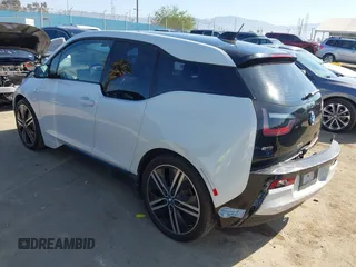 2017 BMW i3 z VIN WBY1Z8C31HV894473, wystawiony jako IAAI lot #41870525 z przebiegiem 96 414 mil mil oraz . Historia ofert i sprzedaży dostępna na DreamBid. Obrazek 3.
