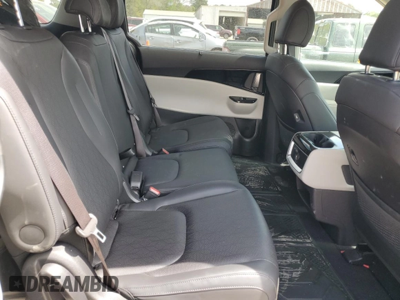 2024 Kia Carnival EX with VIN KNDNC5H3XR6404619, listed as a Copart auction lot 50740555 with 23,374 mi miles and Salvage Title. Bid and sale history available at carsss.com. Image 12.