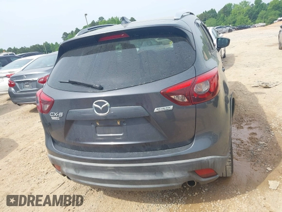 2016 Mazda CX-5 Grand Touring z VIN JM3KE2DY5G0801238, wystawiony jako IAAI lot #42264694 z przebiegiem 136 993 mil mil oraz . Historia ofert i sprzedaży dostępna na DreamBid. Obrazek 15.