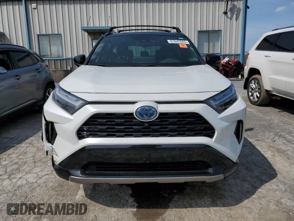 2023 Toyota RAV4 Hybrid XSE with VIN 2T3E6RFVXPW040152, listed as a Copart auction lot 61645565 with 26,408 mi miles and Salvage title. Bid and sale history available at DreamBid. Image 5.