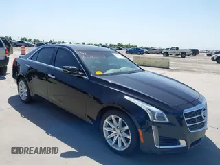 2014 Cadillac CTS Luxury RWD z VIN 1G6AR5SX3E0196348, wystawiony jako IAAI lot #42282732 z przebiegiem 130 956 mil mil oraz . Historia ofert i sprzedaży dostępna na DreamBid. Obrazek 1.
