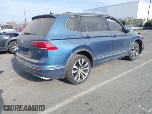 2018 Volkswagen Tiguan SEL Premium with VIN 3VV5B7AX0JM218427, listed as a IAAI auction lot 41188087 with 46,877 mi miles and . Bid and sale history available at DreamBid. Image 4.