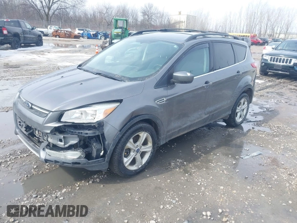 2014 Ford Escape SE with VIN 1FMCU9GX0EUA37649, listed as a IAAI auction lot 41834356 with 189,953 mi miles. Bid and sale history available at carsss.com. Image 2.