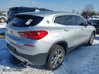 2018 BMW X2 xDrive28i with VIN WBXYJ5C33JEF82446, listed as a IAAI auction lot 41260076 with 50,278 mi miles. Bid and sale history available at carsss.com. Image 4.