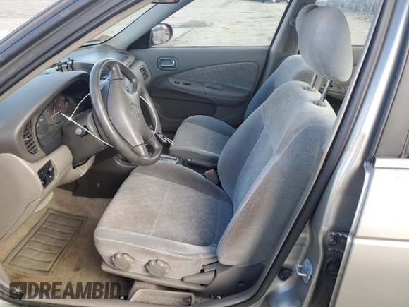 2001 Nissan Sentra GXE z VIN 3N1CB51D51L514813, wystawiony jako Copart lot #49574495 z przebiegiem 93 849 mil mil oraz Szkoda całkowita • Salvage title. Historia ofert i sprzedaży dostępna na DreamBid. Obrazek 7.