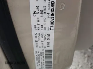 2014 Chrysler Town & Country Touring z VIN 2C4RC1BG0ER293958, wystawiony jako Copart lot #52172065 z przebiegiem 139 922 mil mil oraz Szkoda całkowita • Salvage title. Historia ofert i sprzedaży dostępna na DreamBid. Obrazek 13.