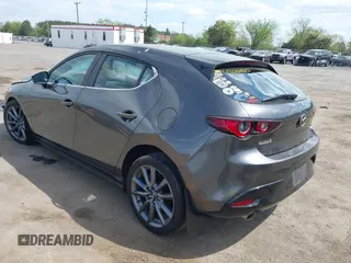 2023 Mazda 3 S Select with VIN JM1BPAKM3P1615785, listed as a IAAI auction lot 42064302 with 63,928 mi miles and . Bid and sale history available at DreamBid. Image 3.