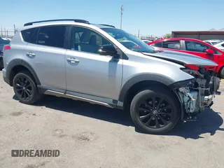 2018 Toyota RAV4 XLE z VIN 2T3WFREV9JW424260, wystawiony jako IAAI lot #42327772 z przebiegiem 40 313 mil mil oraz . Historia ofert i sprzedaży dostępna na DreamBid. Obrazek 1.