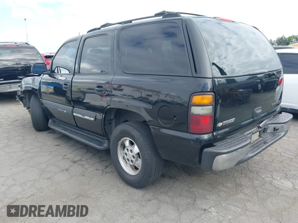 2005 Chevrolet Tahoe Z71 with VIN 1GNEC13TX5R145310, listed as a IAAI auction lot 42056793 with 159,002 mi miles and . Bid and sale history available at DreamBid. Image 3.