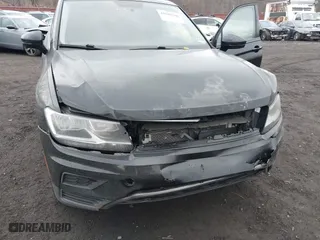 2018 Volkswagen Tiguan S with VIN 3VV1B7AX9JM091210, listed as a IAAI auction lot 41683380 with 63,627 mi miles. Bid and sale history available at carsss.com. Image 6.