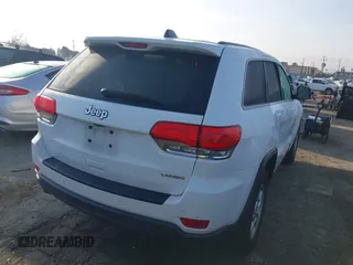 2017 Jeep Grand Cherokee Laredo with VIN 1C4RJEAG3HC696635, listed as a IAAI auction lot 41594123 with 97,502 mi miles. Bid and sale history available at carsss.com. Image 4.