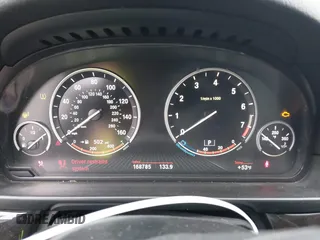 2015 BMW 5 Series 535i with VIN WBA5B1C56FG126888, listed as a IAAI auction lot 41722011 with 168,785 mi miles and . Bid and sale history available at carsss.com. Image 7.