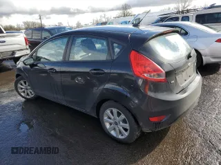 2012 Ford Fiesta SE z VIN 3FADP4EJ4CM183237, wystawiony jako Copart lot #48825605 z przebiegiem 92 798 mil mil oraz Szkoda całkowita • Salvage title. Historia ofert i sprzedaży dostępna na DreamBid. Obrazek 2.
